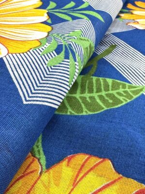 TECIDO CHITÃO FUNDO AZUL COM MARGARIDAS